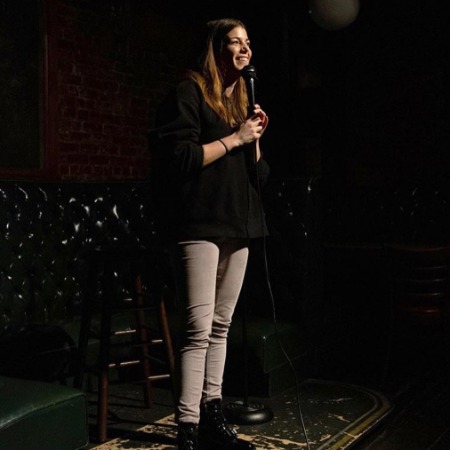 Mae Planert during one of her stand-up comedies in Brooklyn, New York. 